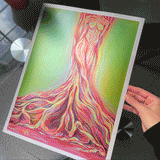 Animation of a giclee art print of a woman's figure painted into the trunk of a tree showing the metallic and iridescent finish of the art print paper